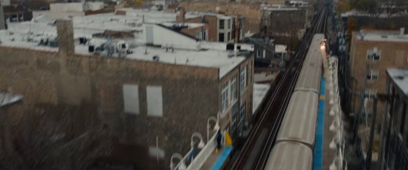 Ironheart streaks away from an L Train.