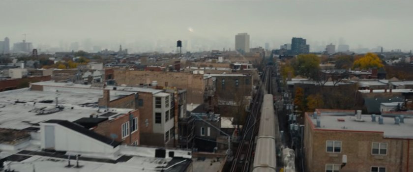 Ironheart streaks away from an L Train.