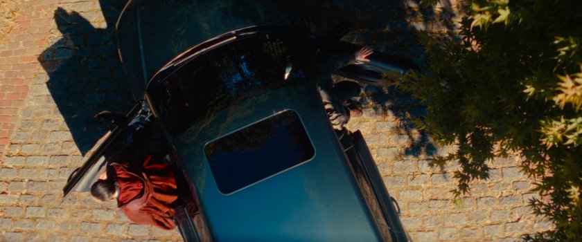 The Hood and Joe exit a car outside a fancy mansion.