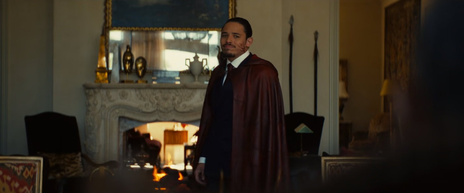The Hood in his father's mansion.
