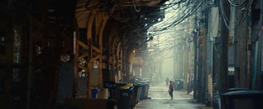 Parker on a street outside Stanton's Sweets Reads & More.