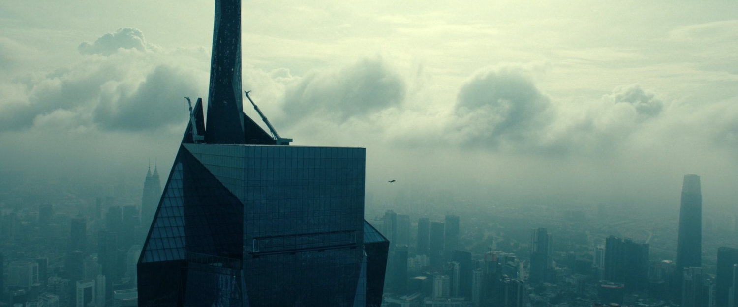 Yelena jumping off a building in Kuala Lumpur.