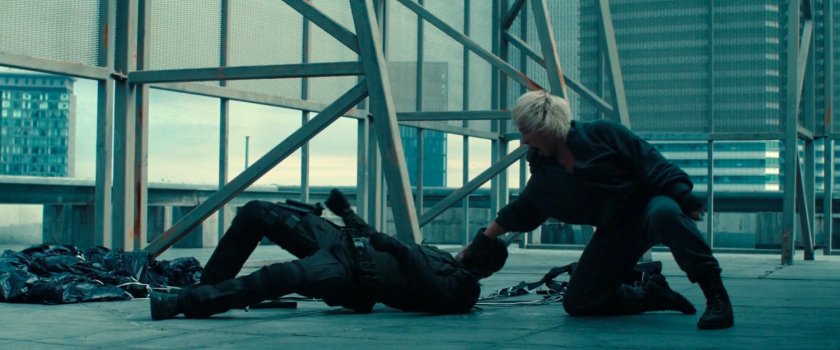 Yelena fighting a guard on a rooftop in Kuala Lumpur.