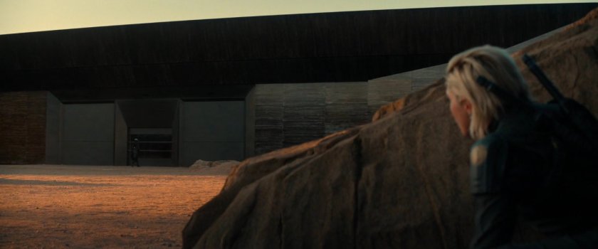 Yelena watching Ghost enter the OXE Vault.