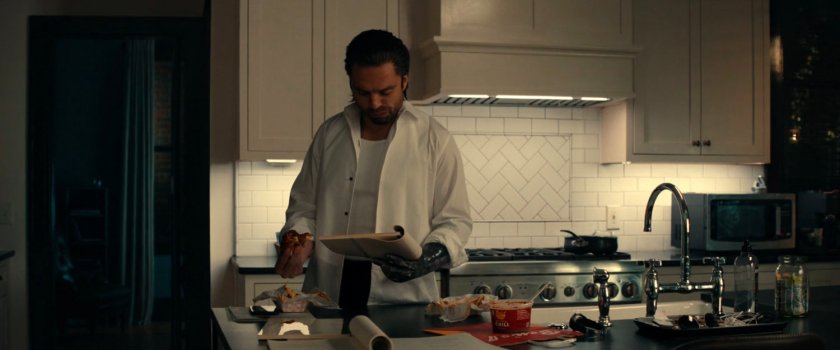Bucky in the kitchen of his apartment.