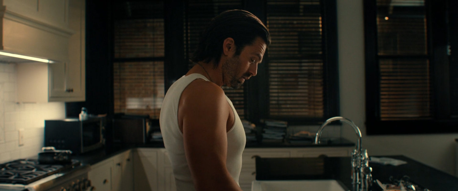 Bucky in the kitchen of his apartment.