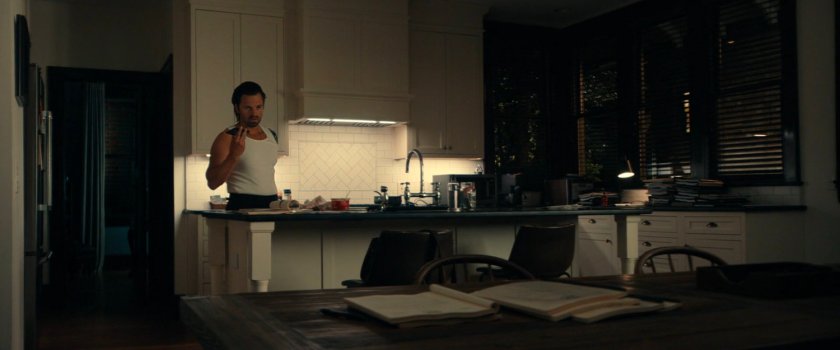 Bucky in the kitchen of his apartment.