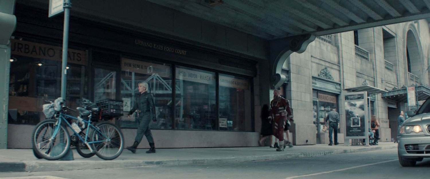 Yelena and Alexei on the sidewalk outside of the Watchtower.