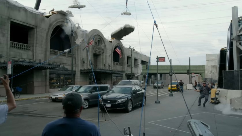 Behind the scenes image of New York battle scene recreated on backlot.