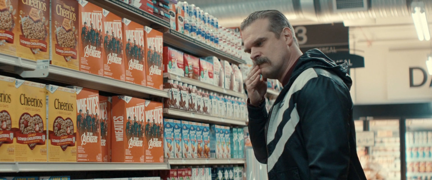 Alexei in the cereal aisle of a grocery store.