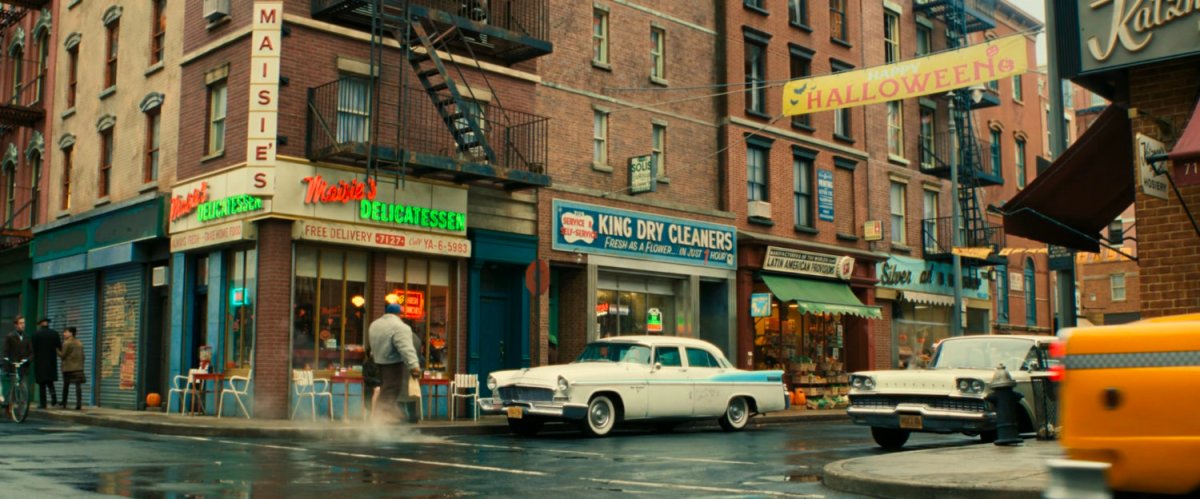 Ben walking along a sidewalk on Yancy Street.