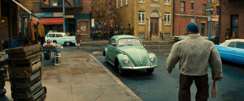 Ben walking along a sidewalk on Yancy Street.