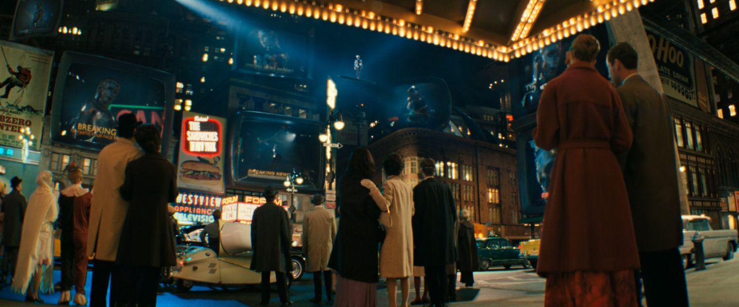 People watching the Silver Surfer in Times Square.
