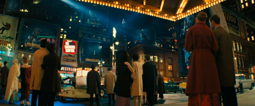 People watching the Silver Surfer in Times Square.