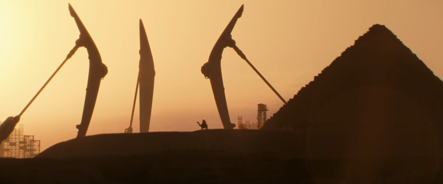 Components of the teleportation bridge being assembled outside the pyramids.