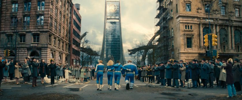 The Fantastic Four walk along a street towards the Baxter Building.
