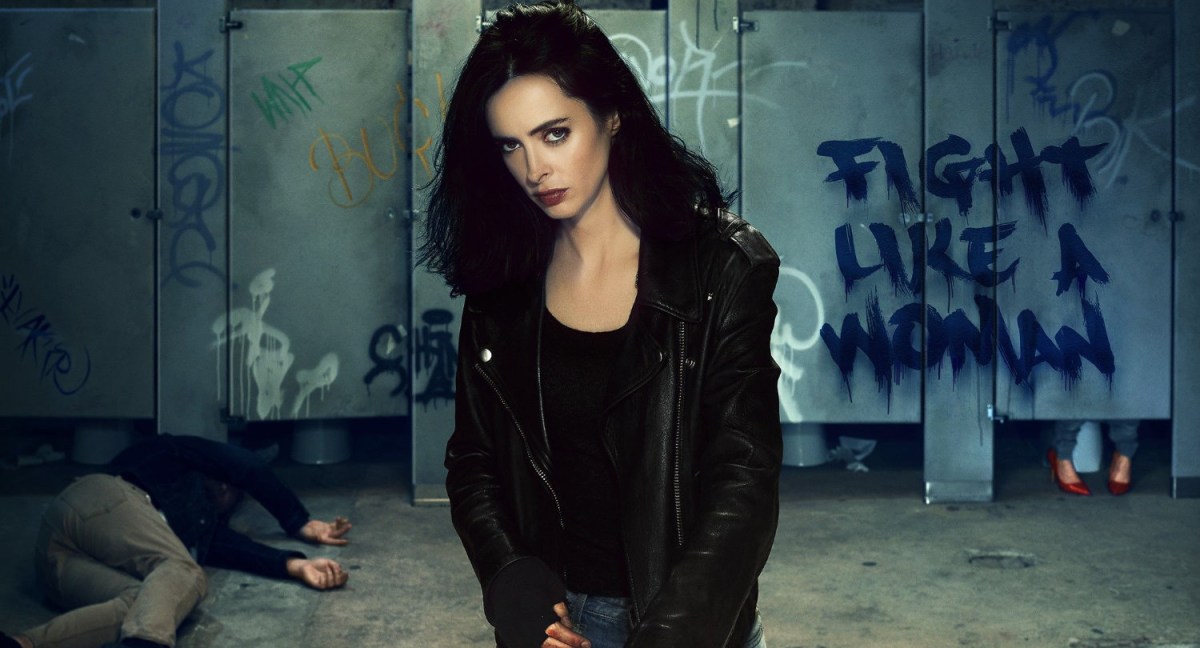 Jessica Jones Season Two promo image of Jessica in a graffiti laden bathroom.