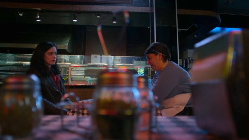 Jessica meeting with Mavis at a pizza restaurant.