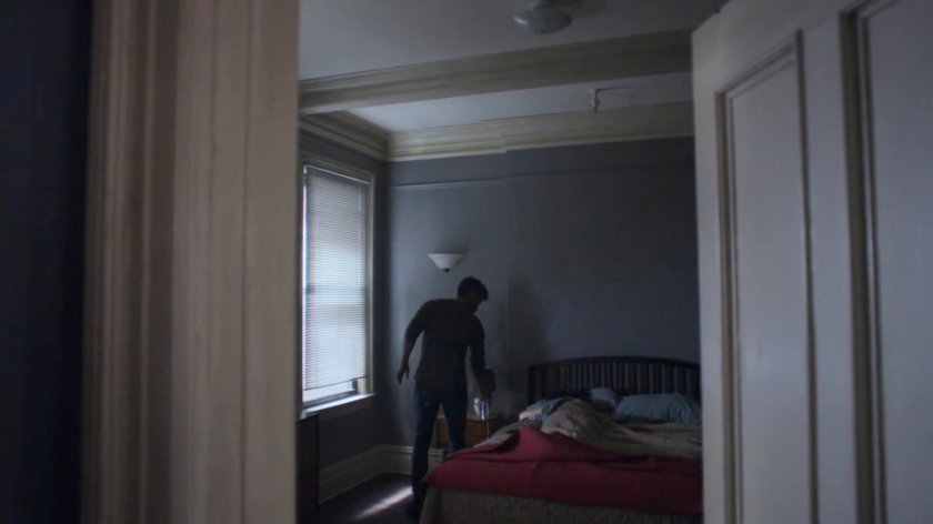 Malcolm waking Jessica in her bedroom.