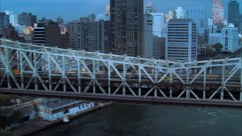 Cab driving across the Queensboro Bridge.