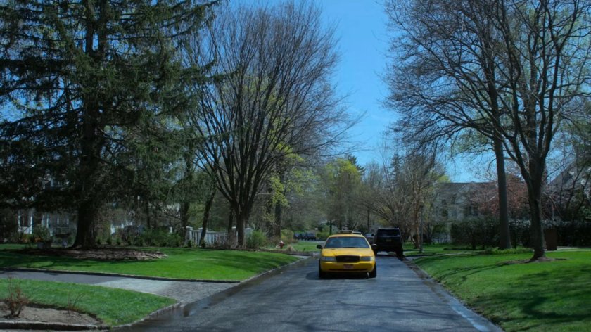 Yellow cab driving through Dr. Koslov's neighborhood.