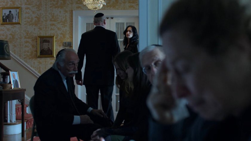 Jessica entering Dr. Koslov's house.