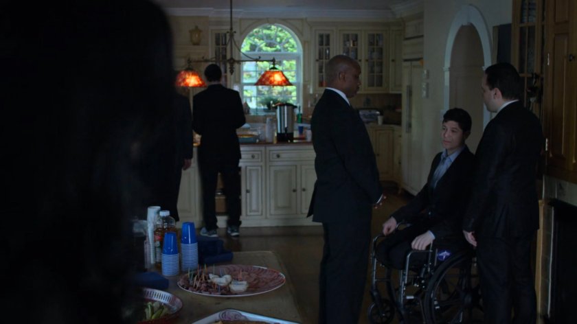 Mourners in Dr. Kozlov's house.