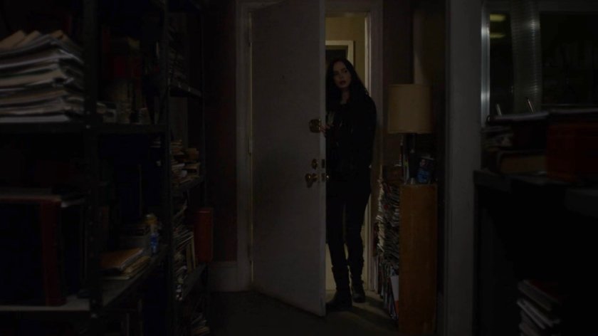Jessica entering Robert Coleman's apartment.