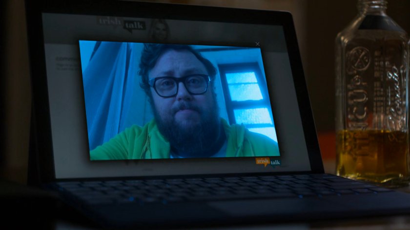 Video of Robert Coleman in his apartment as seen on a laptop.