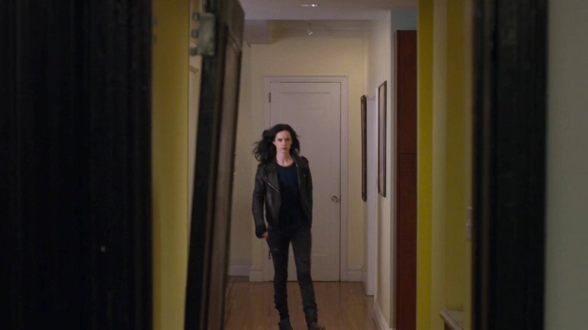 Jessica framed in the doorway of Dorothy Walker's apartment.