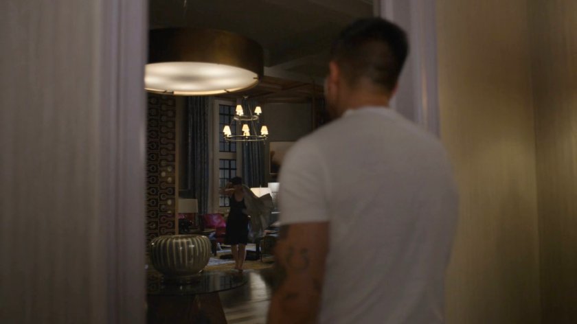 Jeri aproaching Pryce at her apartment door.