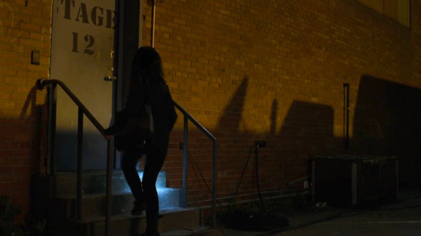 Jessica outside Greenpoint Stages at night.