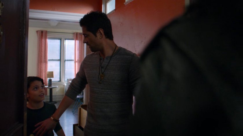 Oscar and Vido in Oscar's apartment.