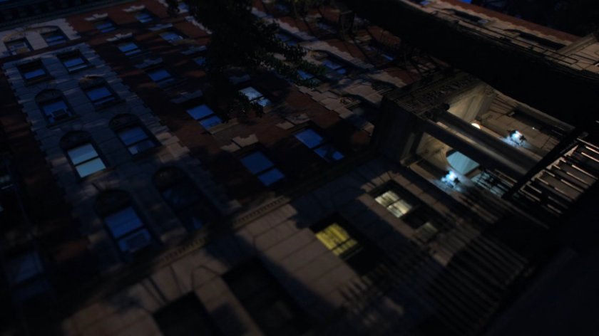 Front entrance to Alias Investigations building at night.