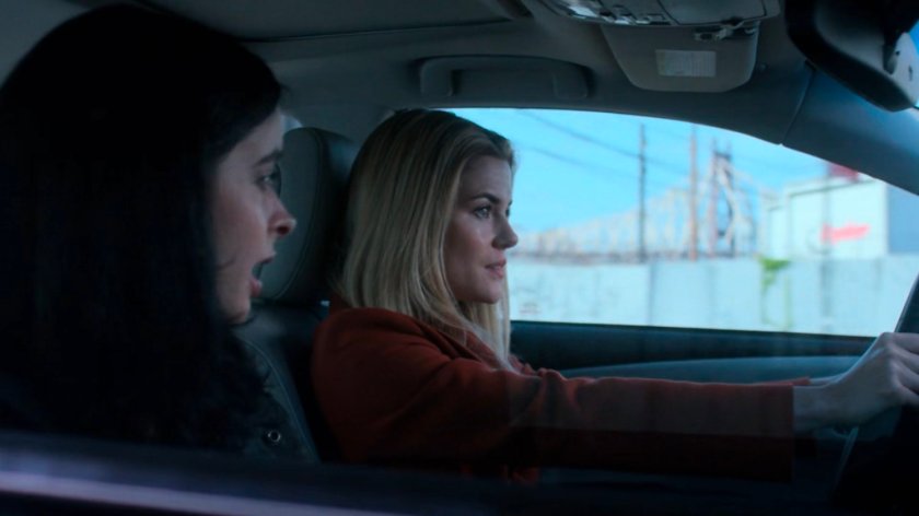 Jessica and Trish driving in a car.