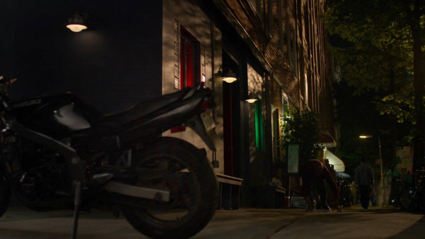 Exterior of dark bar.