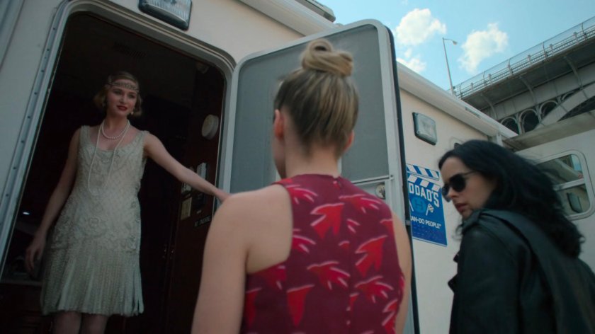 Jessica and Trish speaking to a young actress on a film set.