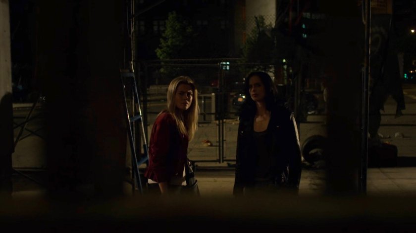 Trish and Jessica outside an old bank building.