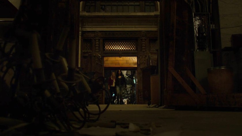 Trish and Jessica inside an old bank building.