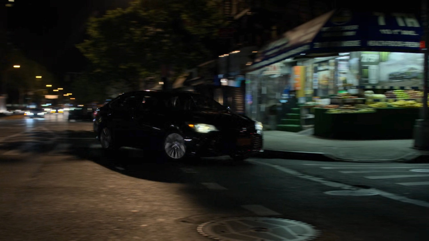 Trish's car taking a turn near Jessica's building.