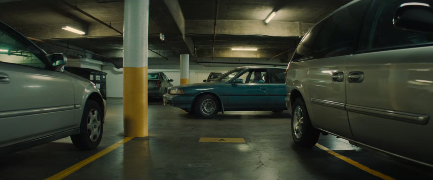 Parking garage at Simon's apartment building.