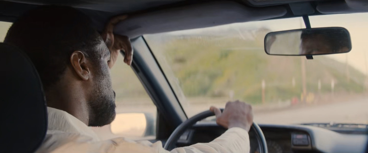 Simon driving his car on Pacific Coast Highway.