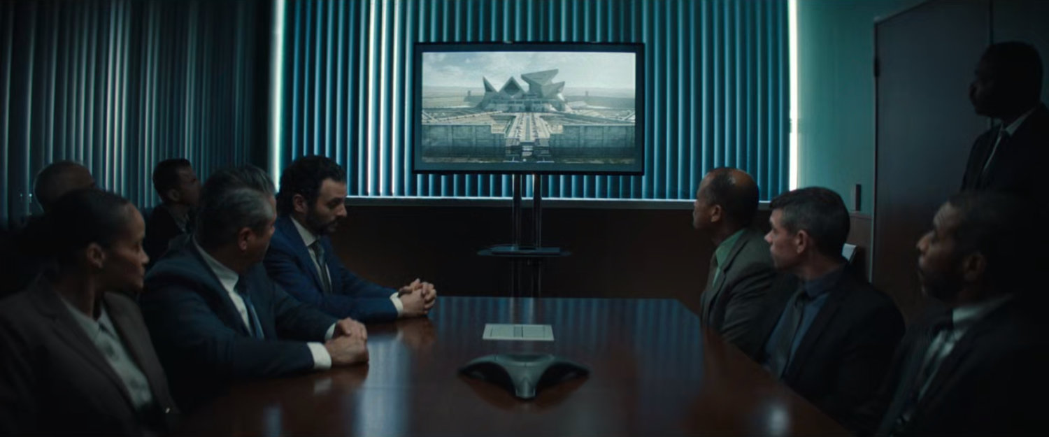 DODC agents in a conference room.