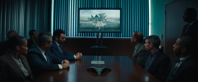 DODC agents in a conference room.