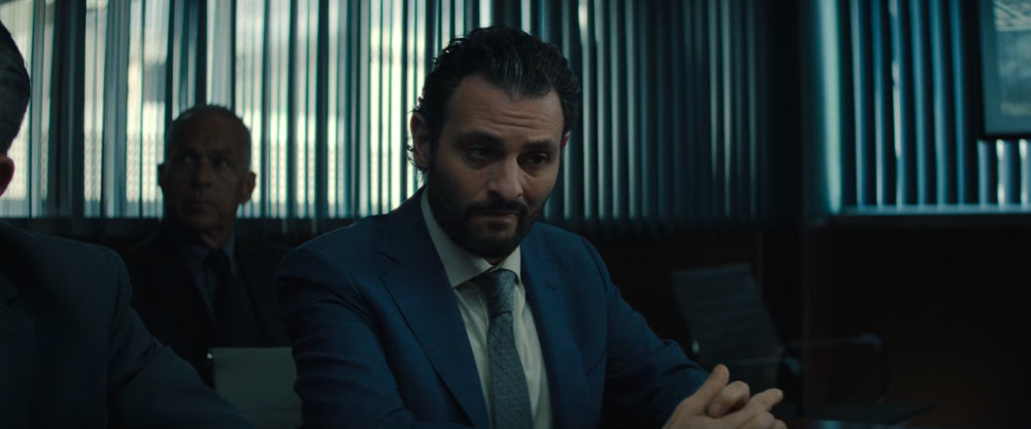 Agent Cleary in a DODC conference room.