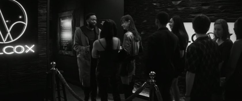 DeMarr Davis admitting people into the Wilcox Club.