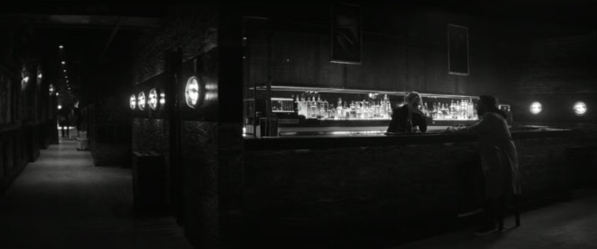 DeMarr and Bridget at the bar of the Wilcox Club.