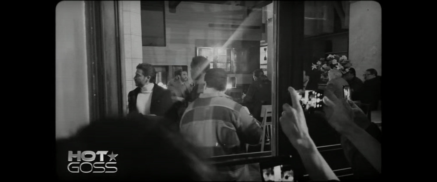 Video footage on Hot Goss of Josh Gad and DeMarr avoiding paparazzi at a restaurant.
