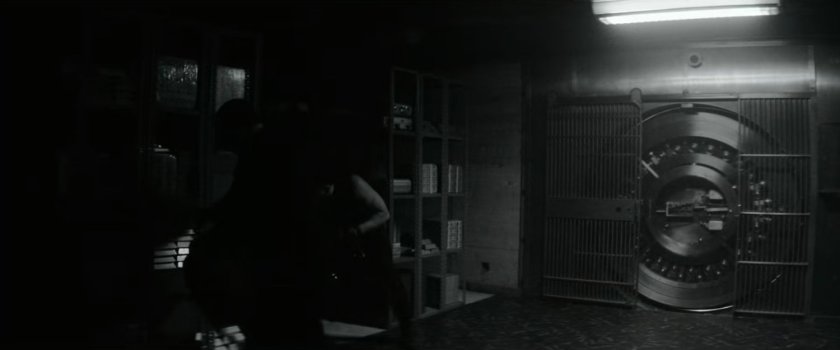 Josh Gad and two other actors inside a bank vault on the set of Cash Grab