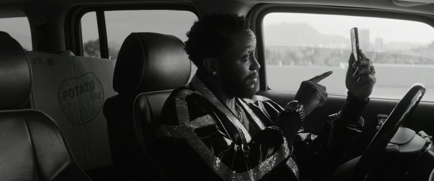 DeMarr recording a live stream from his car.